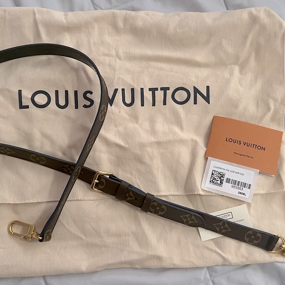 Brand new Louis Vuitton monogram and patent leather adjustable strap